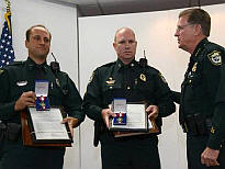 'Humble' deputies express pride, receive awards for saving girl from fire Image